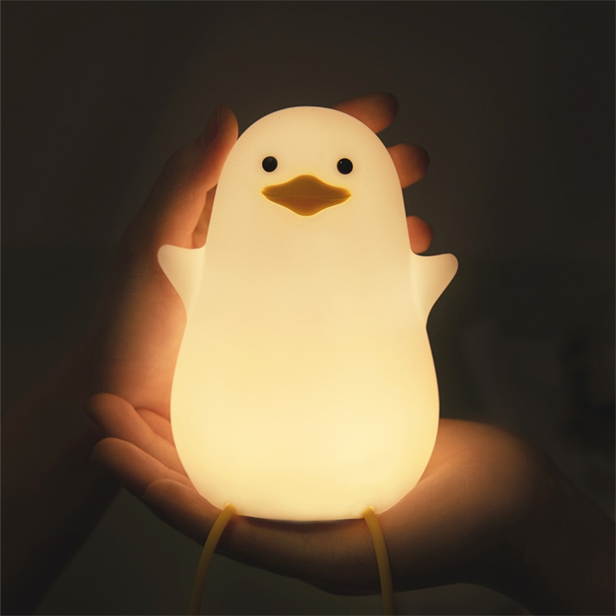 Lampe en forme de petit caneton mignon. Bonne qualité et à la mode