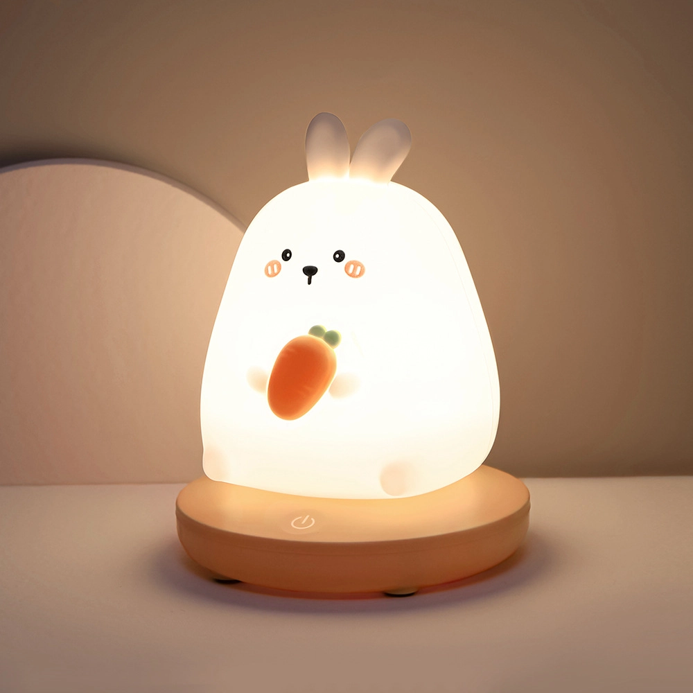 Lampe veilleuse lapin en Silicone avec capteur tactile. Bonne qualité, et à la mode sur une table dans une maison.