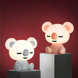 Veilleuse en forme de Koala de couleur rose ou grise.
