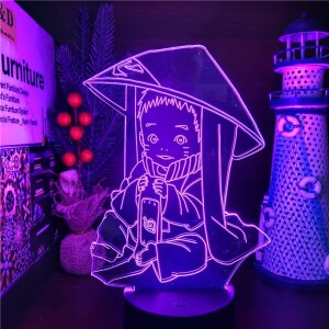 Lampe Veilleuse Bébé Naruto. Bonne qualité et à la mode sur une table à côté d'une vase dans une maison