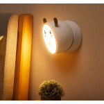 Lampe veilleuse LED tactile cerf. Bonne qualité et à la mode, accrochée sur un mur dans une maison