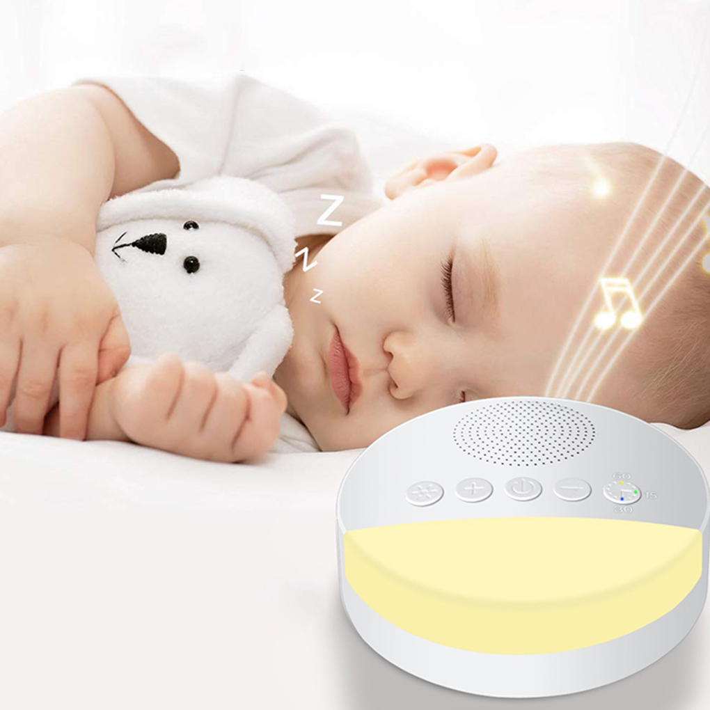 Veilleuse musicale à bruits blancs pour bébé. Bonne qualité et à la mode sur une table de nuit dans à coté d'un lit d'une lit dans une chambre