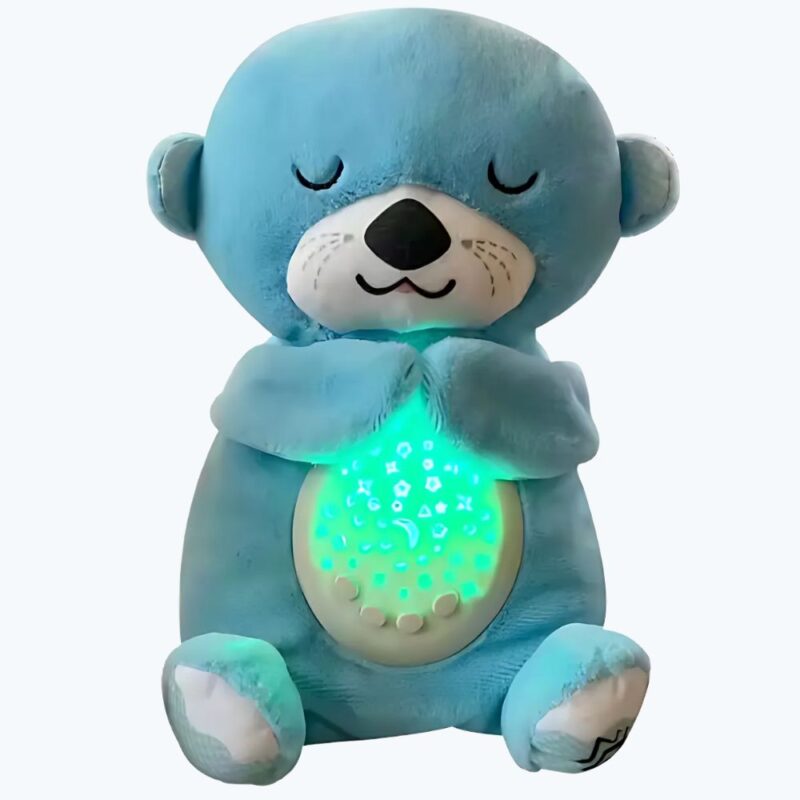 on voit sur un fond clair une veilleuse peluche loutre qui dort de couleur bleue